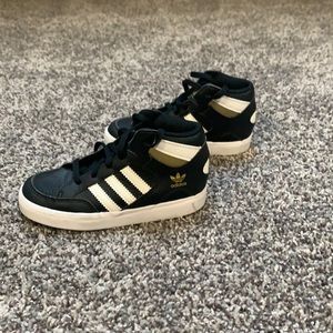 Adidas black gold sneakers